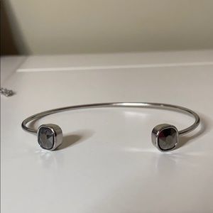 A black/silver cuff bracelet Paparazzi’s